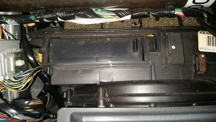 The cabin air filter door removed.