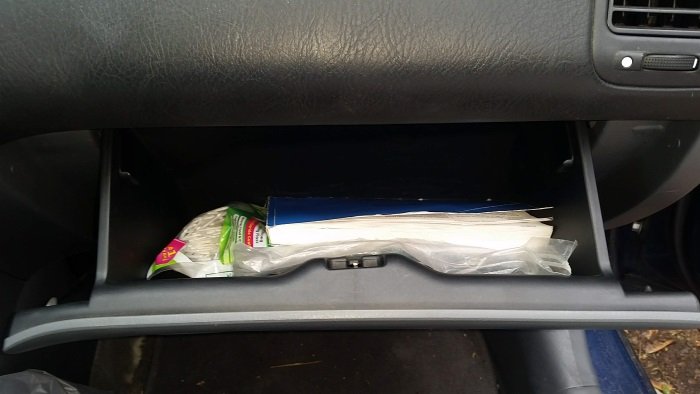 The open glove box.