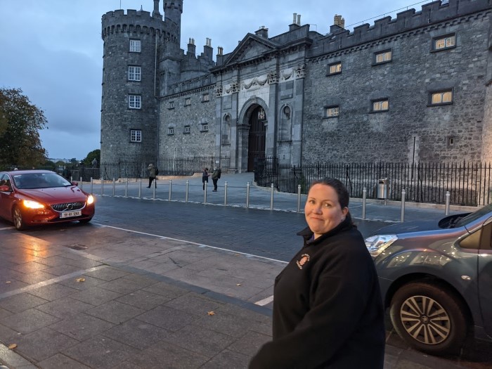 My wife standing in front of Killkenny Castle.